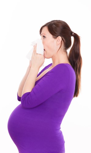 shutterstock_pregnant woman sneezing