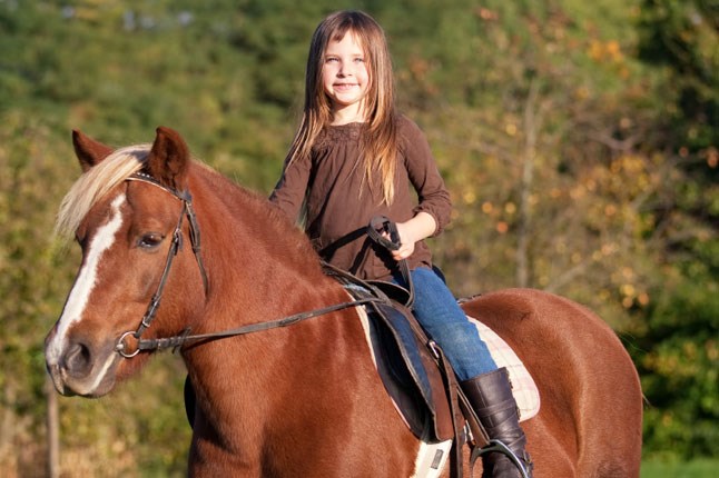 horse_child_girl_cnt_22mar11_istock_b