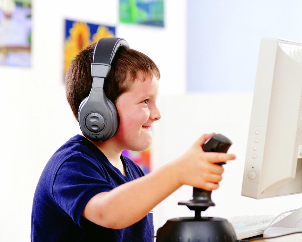 cute-boy-playing-video-games-computer